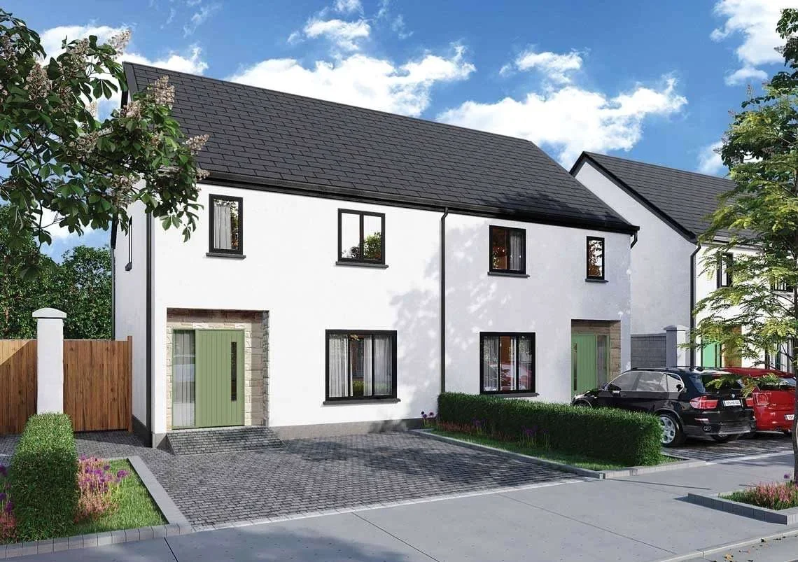 White two-storey homes with slate roofs and landscaped front gardens